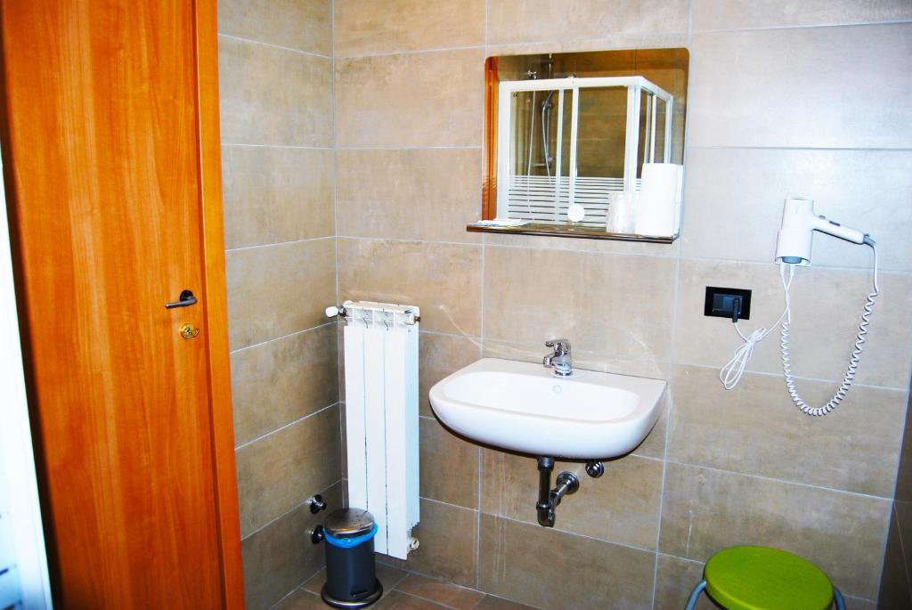 Koupelna v ubytování Albergo Salerno