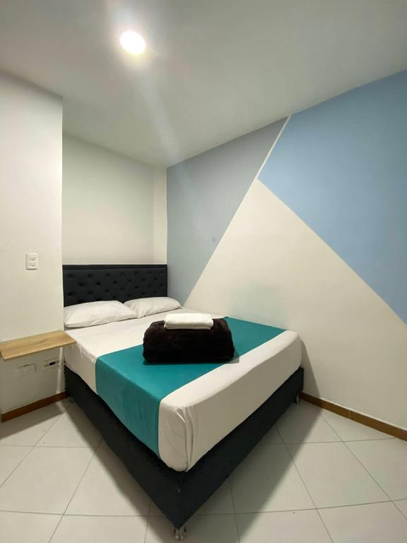 Postel nebo postele na pokoji v ubytování Hotel Picasso 70