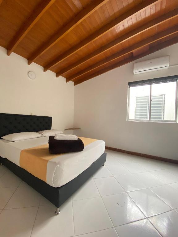 Postel nebo postele na pokoji v ubytování Hotel Picasso 70