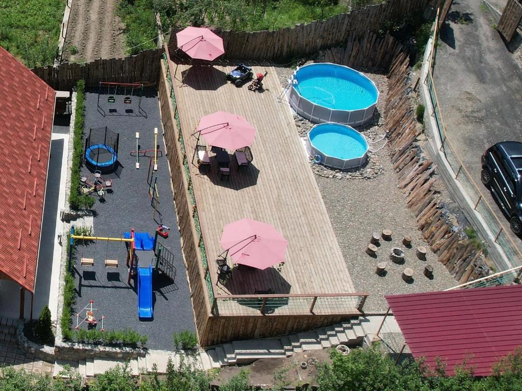 Bazén v ubytování MaRu House nebo v jeho okolí