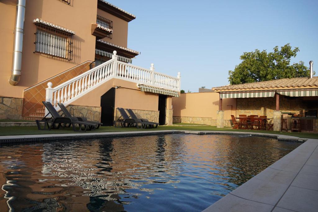 Πισίνα στο ή κοντά στο Villa Oropéndola