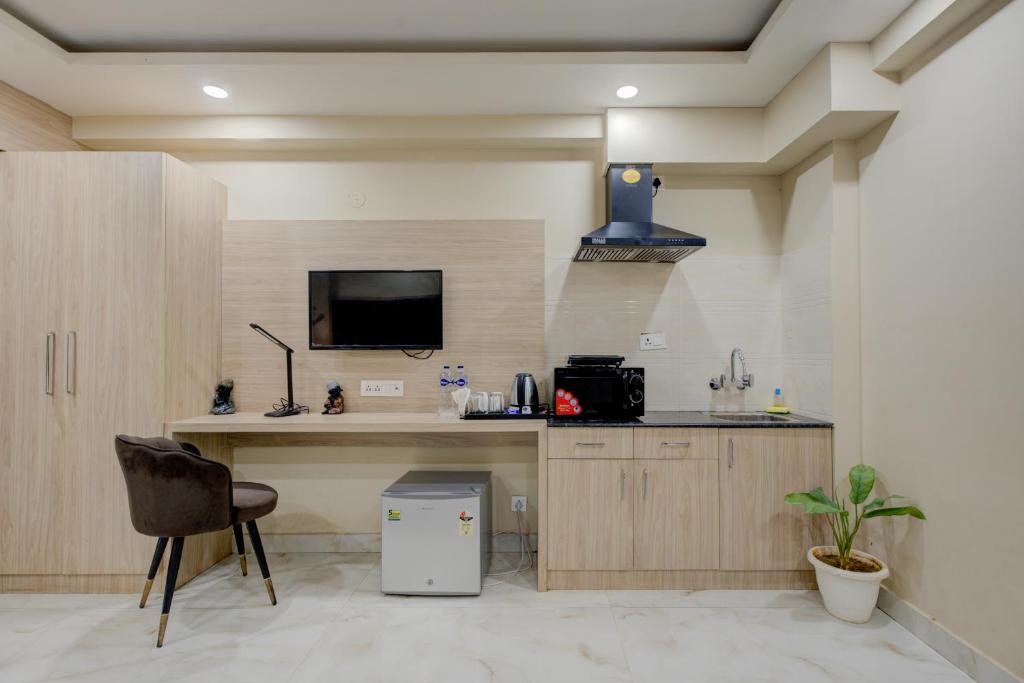 Kuchyň nebo kuchyňský kout v ubytování The Paras Studio Serviced Apartments
