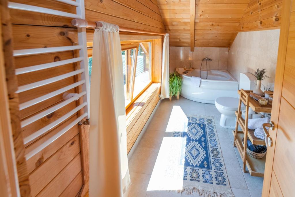 Postel nebo postele na pokoji v ubytování Monte Chalet Kolašin