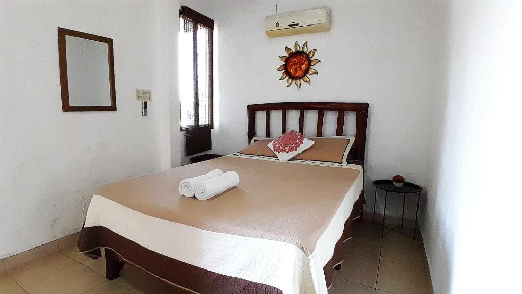 Postel nebo postele na pokoji v ubytování san carlos beach inn