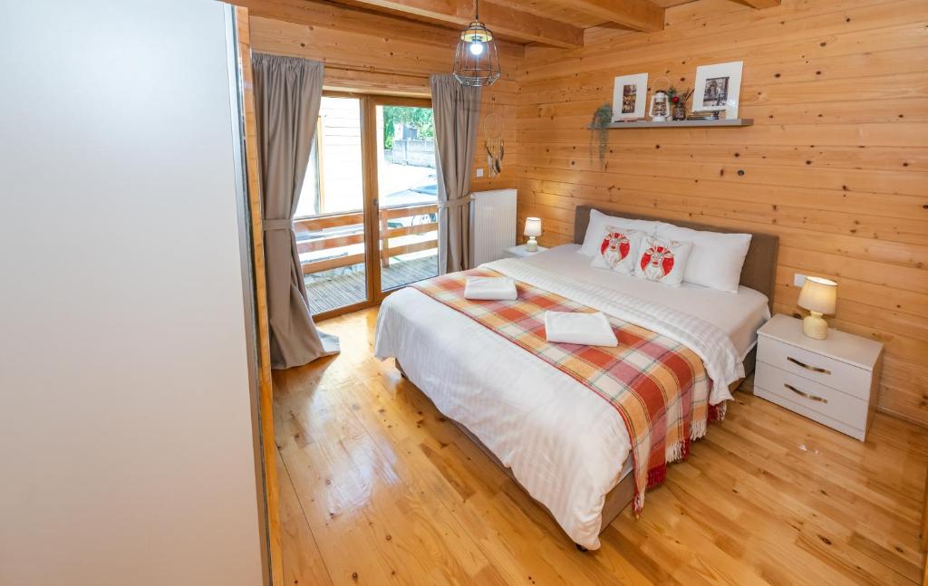 Postel nebo postele na pokoji v ubytování Monte Chalet Kolašin