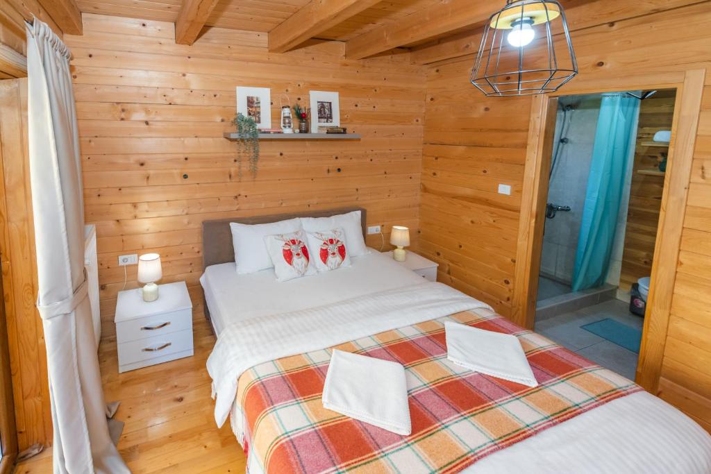 Postel nebo postele na pokoji v ubytování Monte Chalet Kolašin