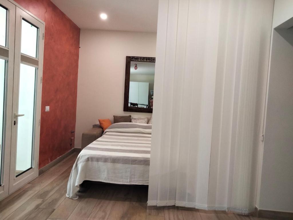 Postel nebo postele na pokoji v ubytování Casa Woow