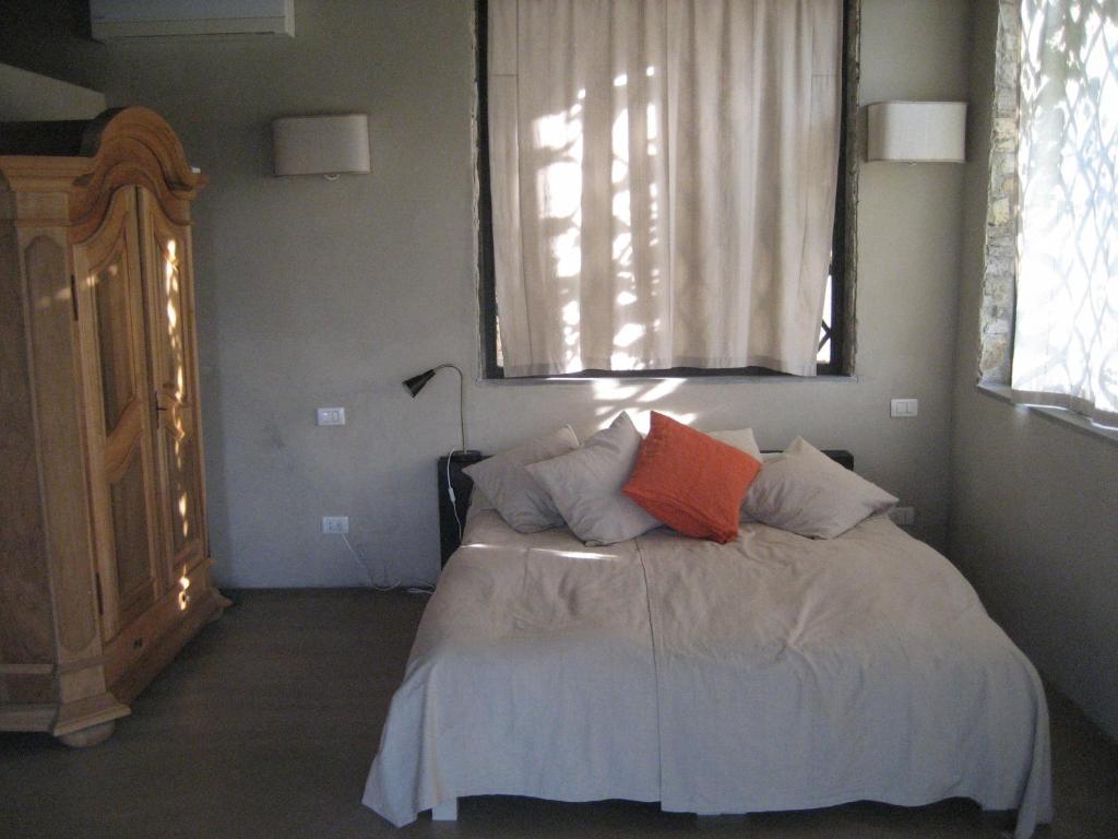 Posteľ alebo postele v izbe v ubytovaní B&B Villa Panicucci