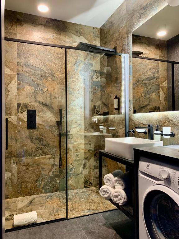 Koupelna v ubytování REMAR - Apartamenty z widokiem na Jezioro Biale