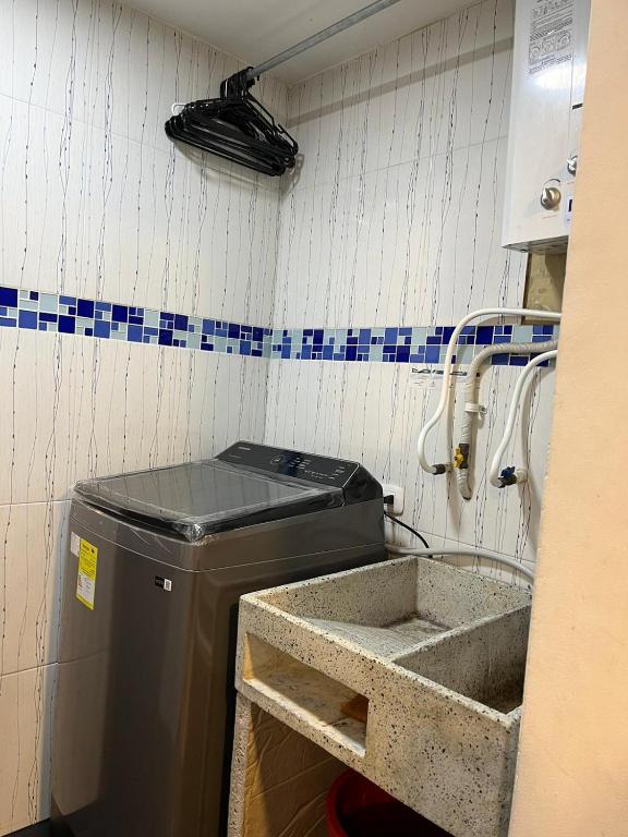 Kuchyň nebo kuchyňský kout v ubytování APARTASUITES BOGOTA 53 - 101a