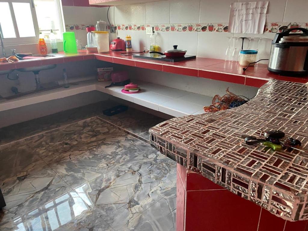 Kuchyň nebo kuchyňský kout v ubytování Hostal MJ