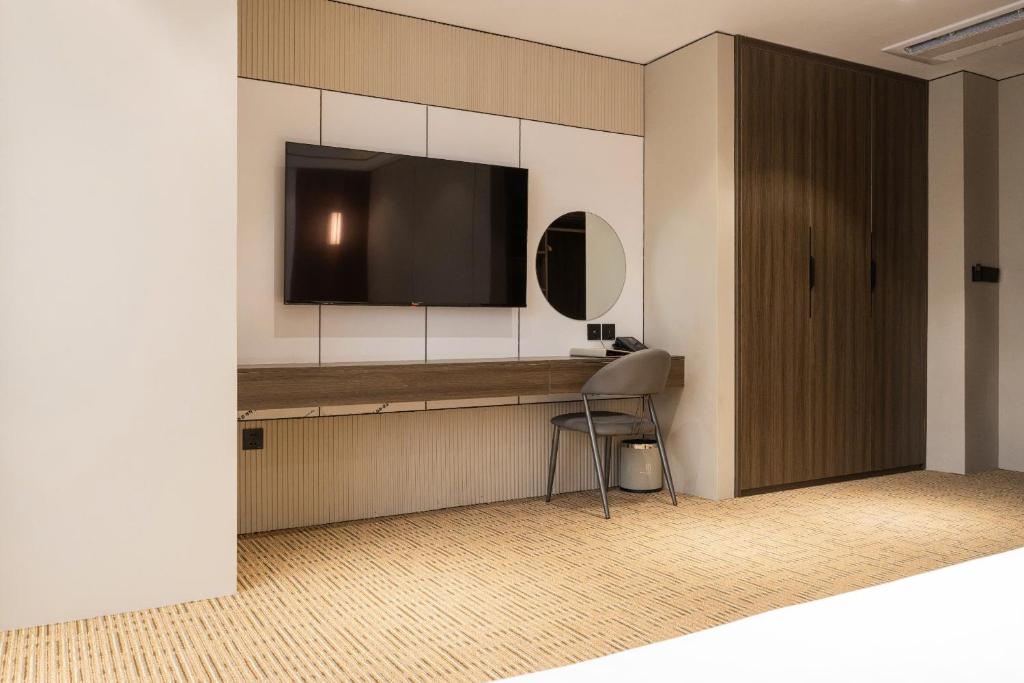 TV a/nebo společenská místnost v ubytování Hanoi International Hotel