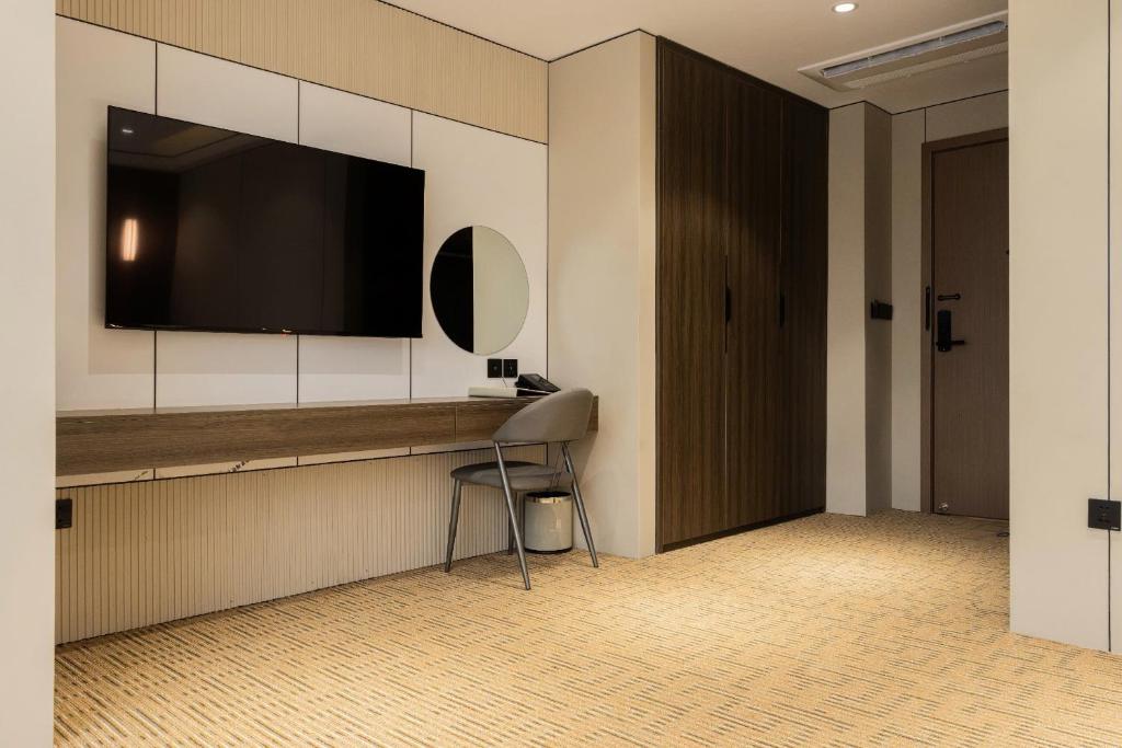 TV a/nebo společenská místnost v ubytování Hanoi International Hotel