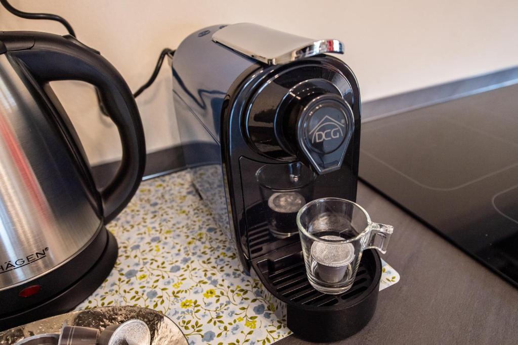 Příslušenství pro přípravu čaje a kávy v ubytování Ospedale a 350m Centro a 900m l Matrimoniali con Bagno Privato l Parcheggio Self Check