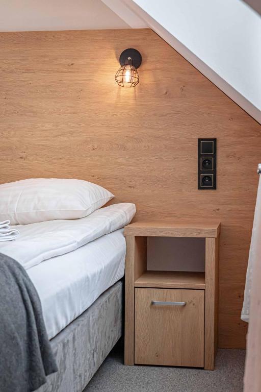 Posteľ alebo postele v izbe v ubytovaní Granada Pensjonat & SPA