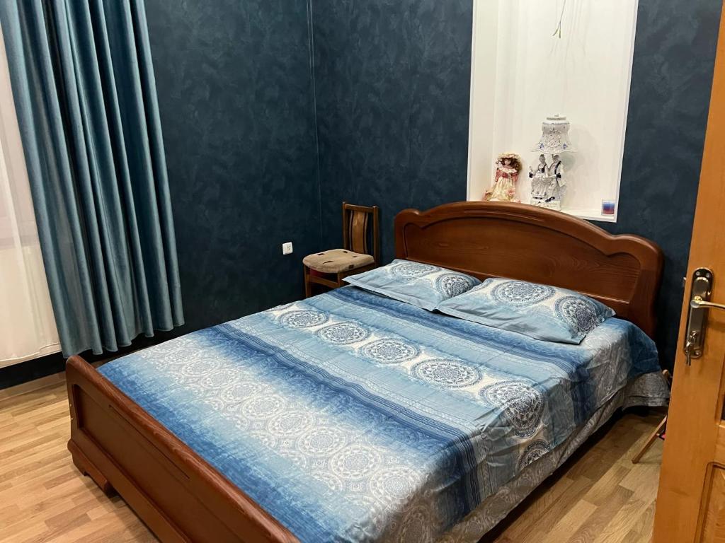 Postel nebo postele na pokoji v ubytování Sesi House