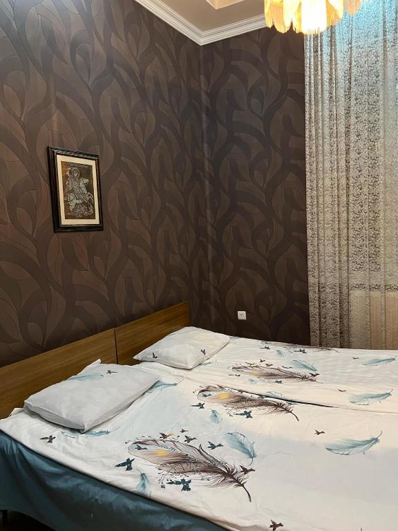 Postel nebo postele na pokoji v ubytování Sesi House
