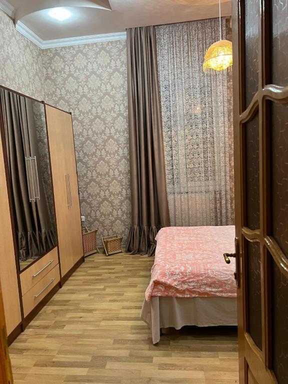 Postel nebo postele na pokoji v ubytování Sesi House