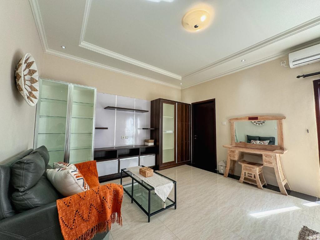 Kuchyň nebo kuchyňský kout v ubytování Merdeka Kuta Guesthouse