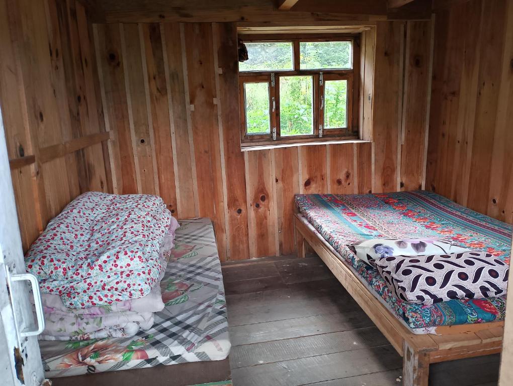 Postel nebo postele na pokoji v ubytování Smile Guest House