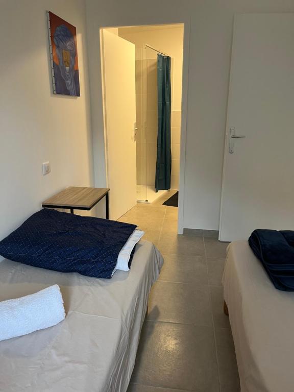 Postel nebo postele na pokoji v ubytování Camilette