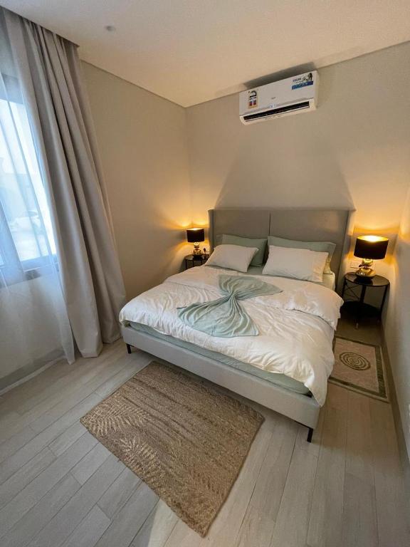 Postel nebo postele na pokoji v ubytování Julia Hawana Salalah