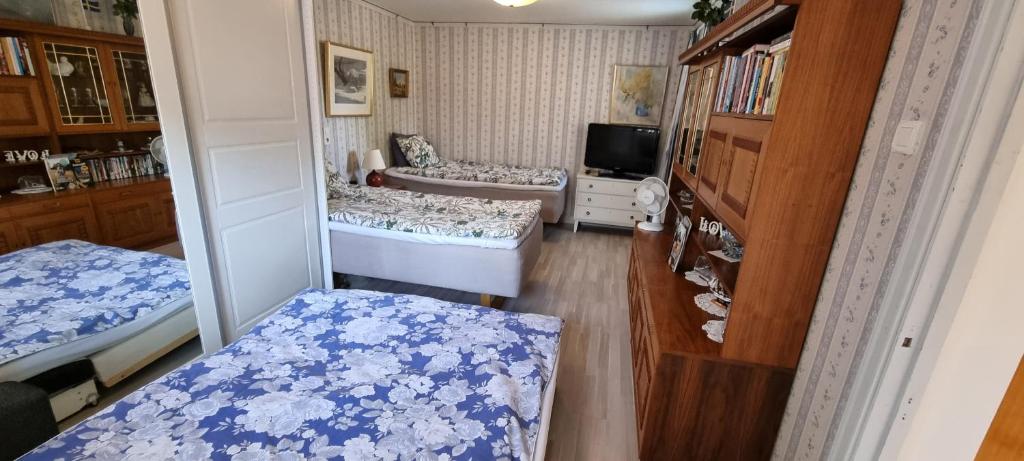Postel nebo postele na pokoji v ubytování Bo i Trelleborg