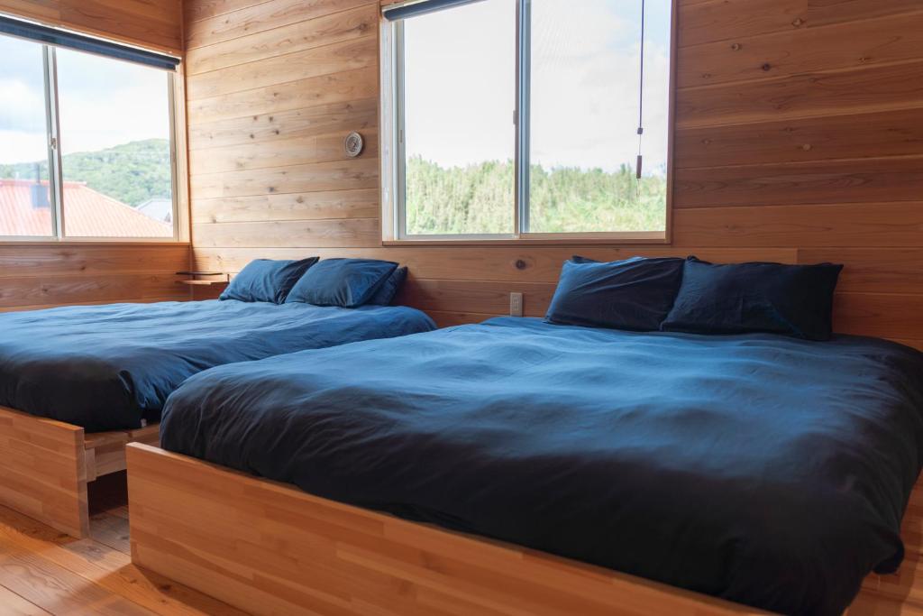 Postel nebo postele na pokoji v ubytování Blu Pointe