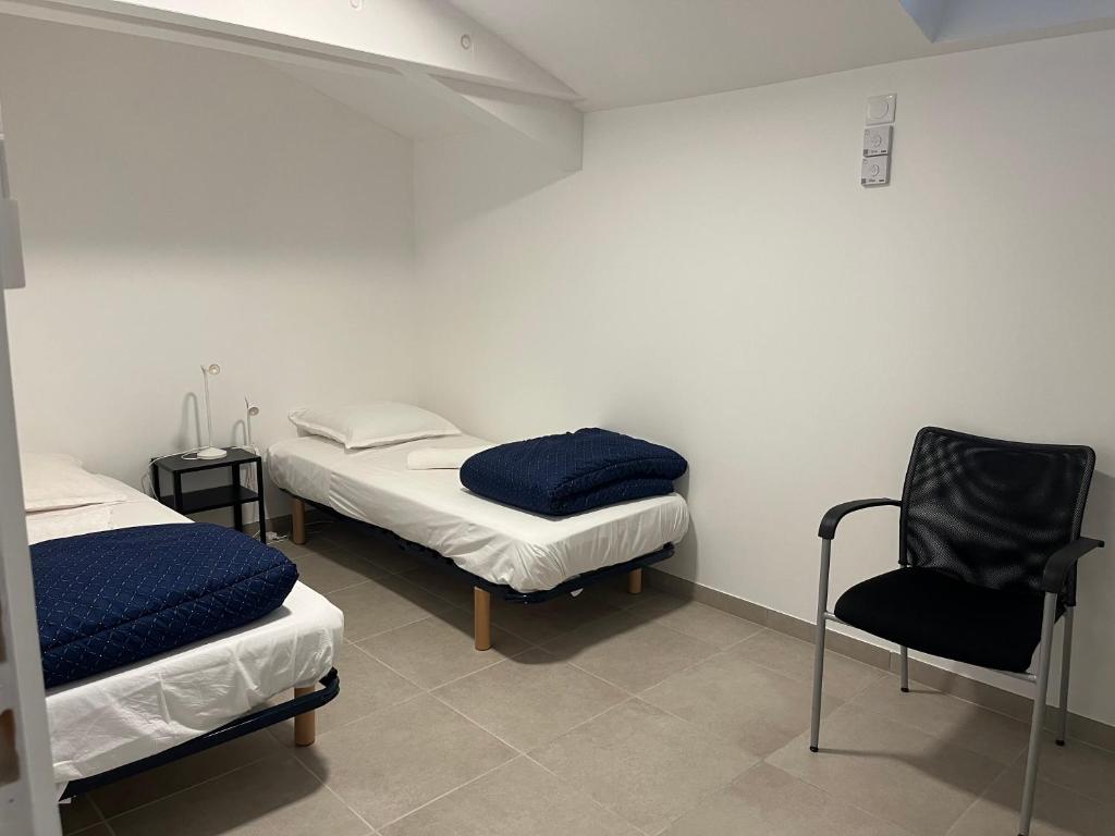 Postel nebo postele na pokoji v ubytování Camilette