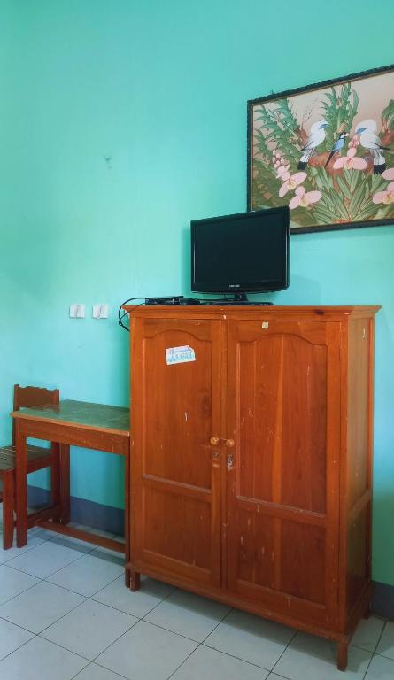 TV a/nebo společenská místnost v ubytování Hotel Kawsar Syariah