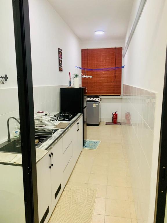 Kuchyň nebo kuchyňský kout v ubytování SJ Home