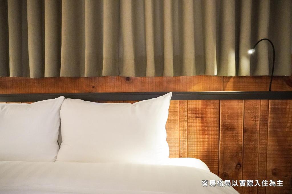 Postel nebo postele na pokoji v ubytování Central Land Hotel