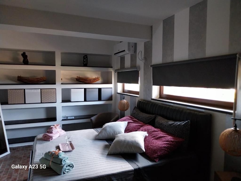 Postel nebo postele na pokoji v ubytování Luxury b&b Le Rocce