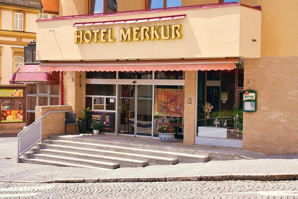 a hotel mexican restaurant on a city street at Hotel Merkur - Jablonec nad Nisou in Jablonec nad Nisou