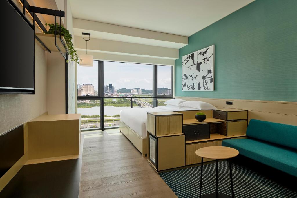 TV a/nebo společenská místnost v ubytování Artyzen Habitat Hengqin Zhuhai