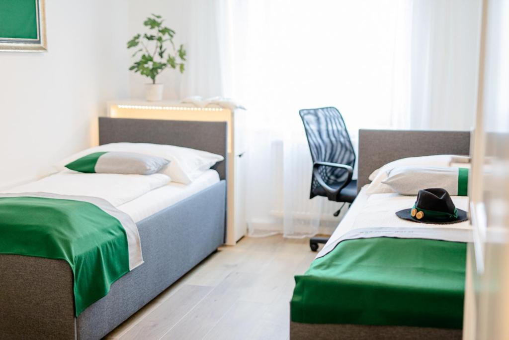 Postel nebo postele na pokoji v ubytování zimmer-graz