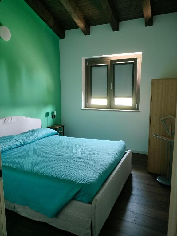 Postel nebo postele na pokoji v ubytování Ta Jevada
