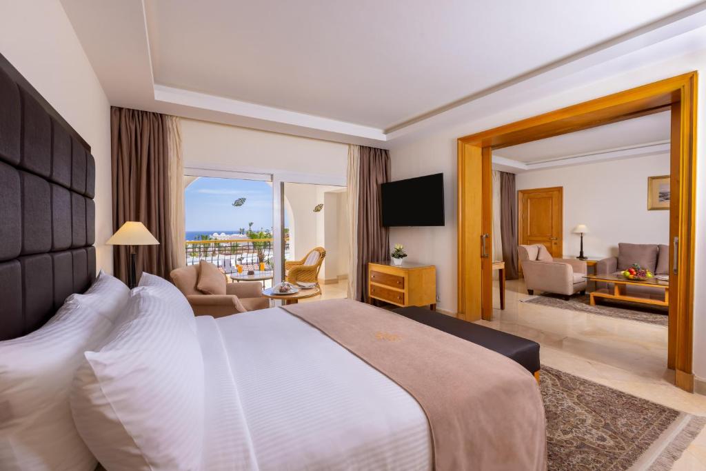 Postel nebo postele na pokoji v ubytování Savoy Sharm El Sheikh