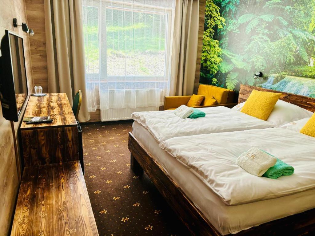 TV a/nebo společenská místnost v ubytování Hotel Raj
