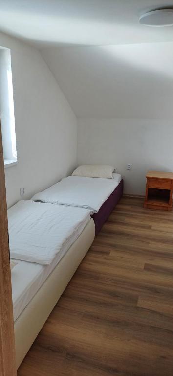 Postel nebo postele na pokoji v ubytování Apartmánový dům TERKA