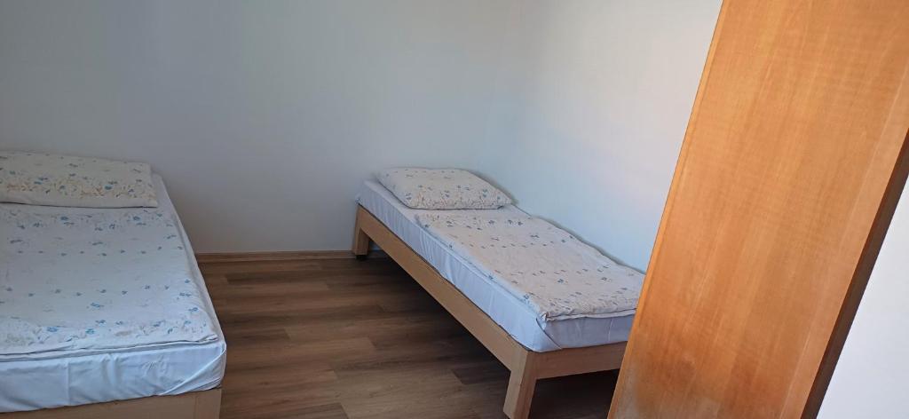Postel nebo postele na pokoji v ubytování Apartmánový dům TERKA