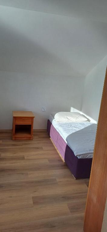 Postel nebo postele na pokoji v ubytování Apartmánový dům TERKA