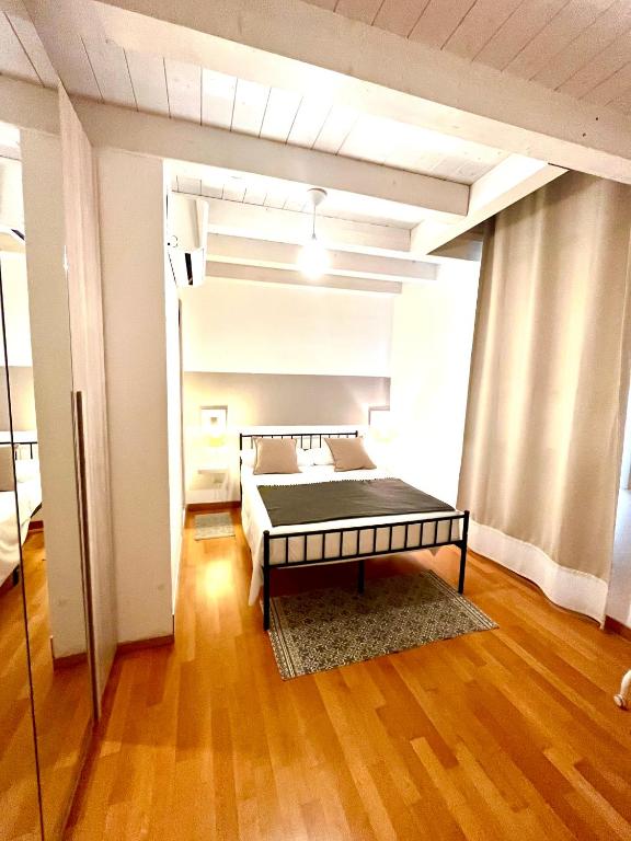 Postel nebo postele na pokoji v ubytování RESIDENZA SERENA B&B -Centro Storico