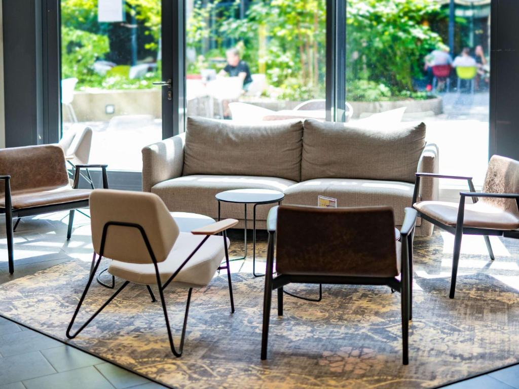 Posezení v ubytování Novotel Suites München Parkstadt Schwabing