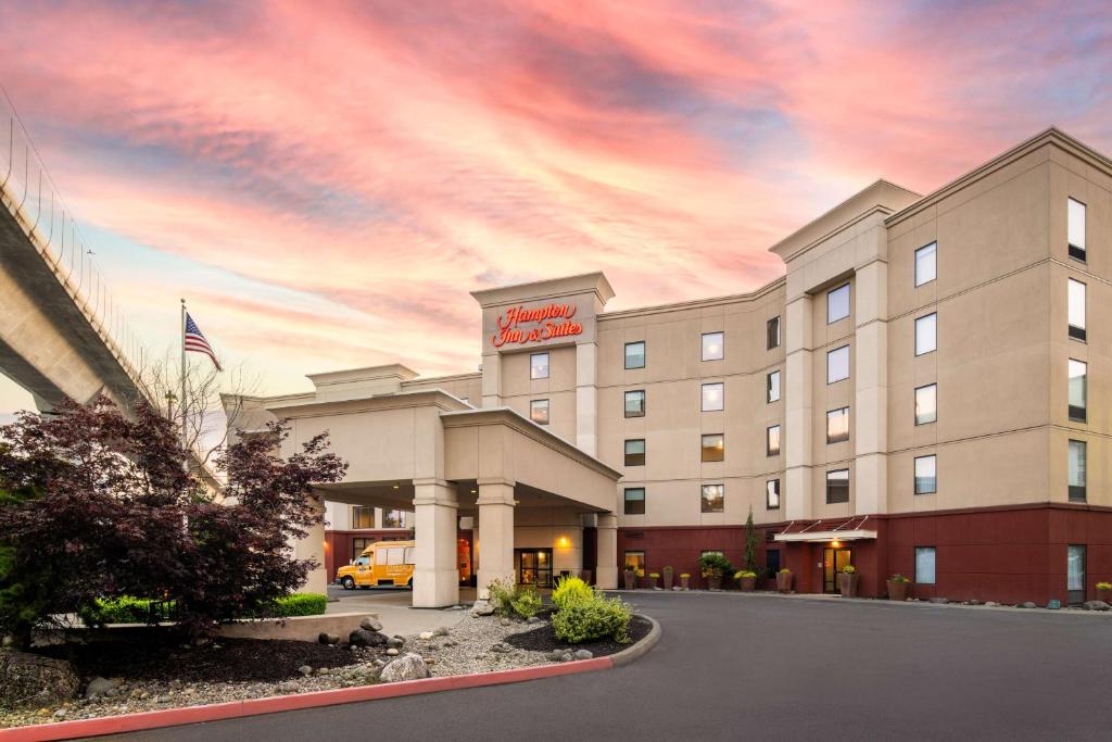 a rendering of a hotel with a sunset at Hampton Inn and Suites Seattle - Airport / 28th Avenue in SeaTac