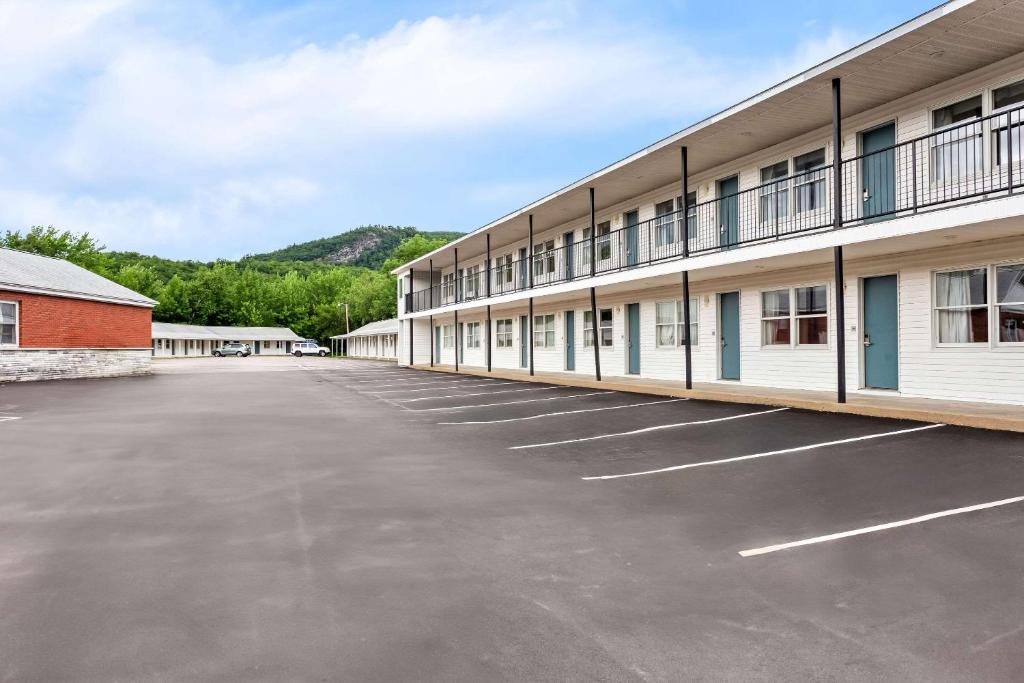 an empty parking lot in front of a building at Quality Inn & Suites in Gorham
