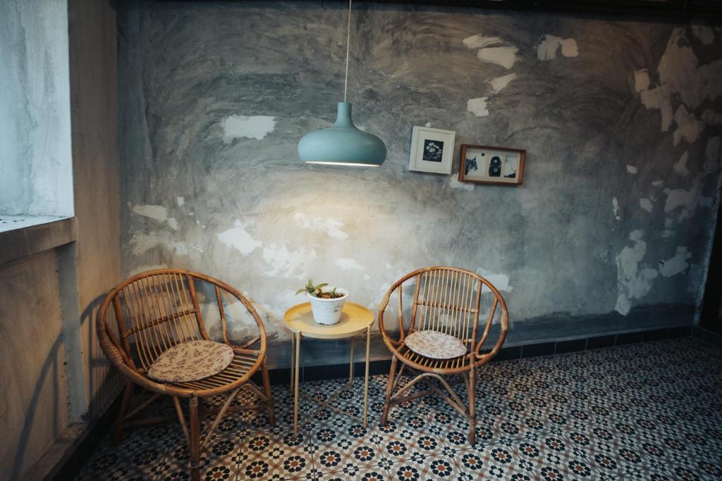 Posezení v ubytování Dé Cafe & Rest House