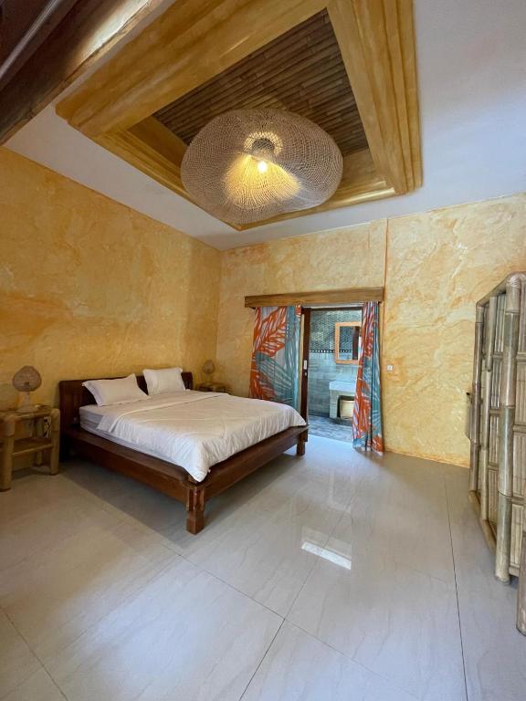 Postel nebo postele na pokoji v ubytování Sampai Jumpa Gili Air