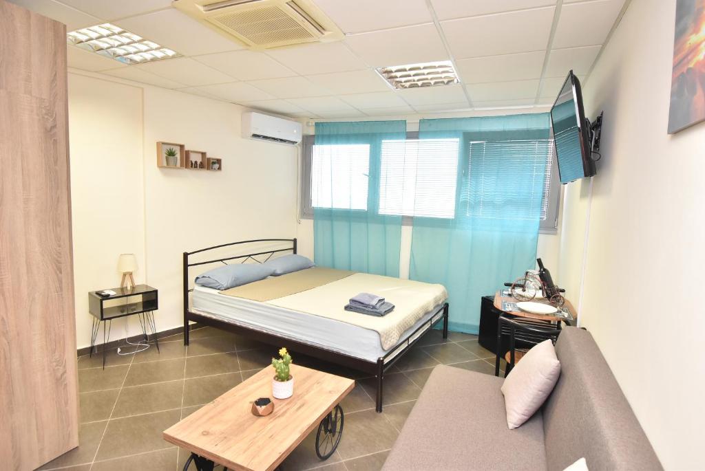 Postel nebo postele na pokoji v ubytování Center4City-Apartment Thessaloniki