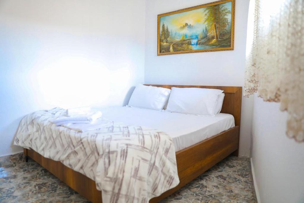 Postel nebo postele na pokoji v ubytování Guesthouse Gogu